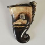 An unusual late 19th century flattened curly horn snuff mull in the form of a cornucopia, the