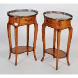 A pair of Continental kingwood and gilt metal mounted occasional tables, the oval tops with