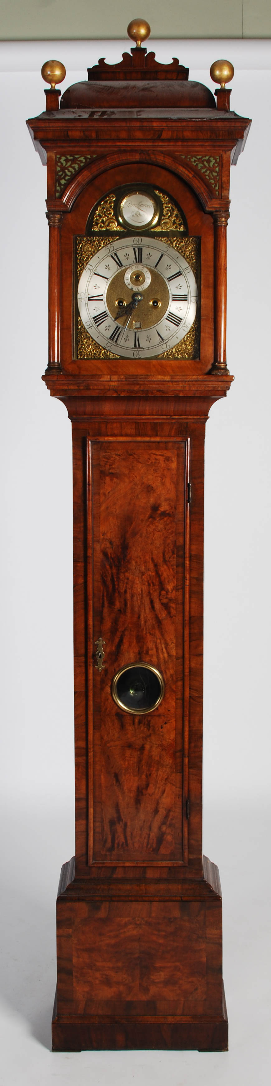 A 17th/ 18th century walnut longcase clock, Peter Laurans, London, the brass dial with silvered