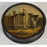 An interesting 19th century black papier-mâché circular snuff box, the detachable cover painted with