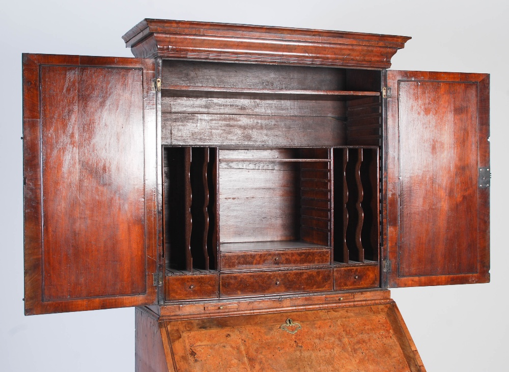 A George III walnut bureau bookcase, the moulded cornice above a pair of mirrored cupboard doors, - Image 10 of 14