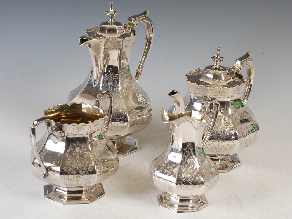 A Victorian silver four piece tea set, Birmingham, 1849 and 1858, makers mark of Elkington & Co.,