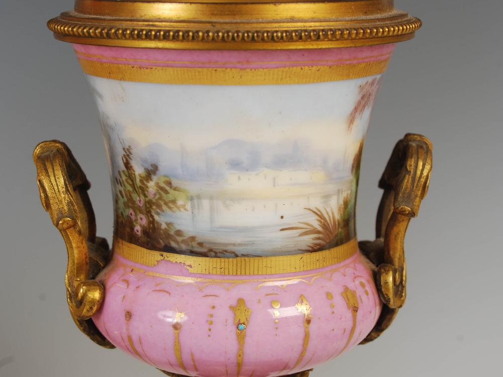 A 19th century ormolu and pink ground porcelain mounted clock garniture, the porcelain dial - Image 4 of 9