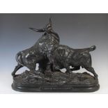 After Léon Mignon, a late 19th century bronze figure group, 'Combat de Taureaux Romains', signed