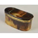 An early 19th century plain horn oblong cut-cornered snuff box, with brass mounts, the collar