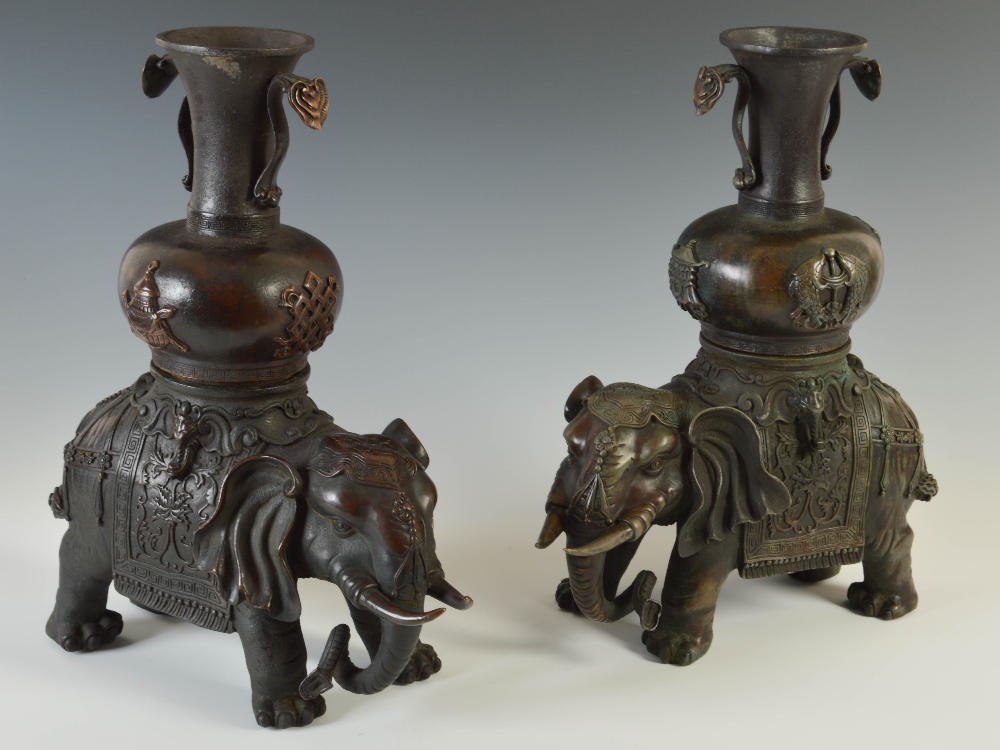 A pair of Chinese bronze elephant incense burners, Qing Dynasty, modelled in two sections, the upper - Image 2 of 6