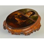 A large 19th century Mauchline burr wood table snuff box, the hinged cover painted with a portrait