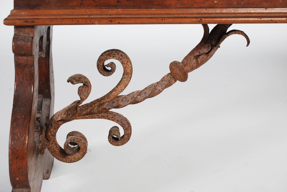 A Spanish walnut bench, probably 17th century and later, the rectangular planked top with moulded - Image 3 of 5