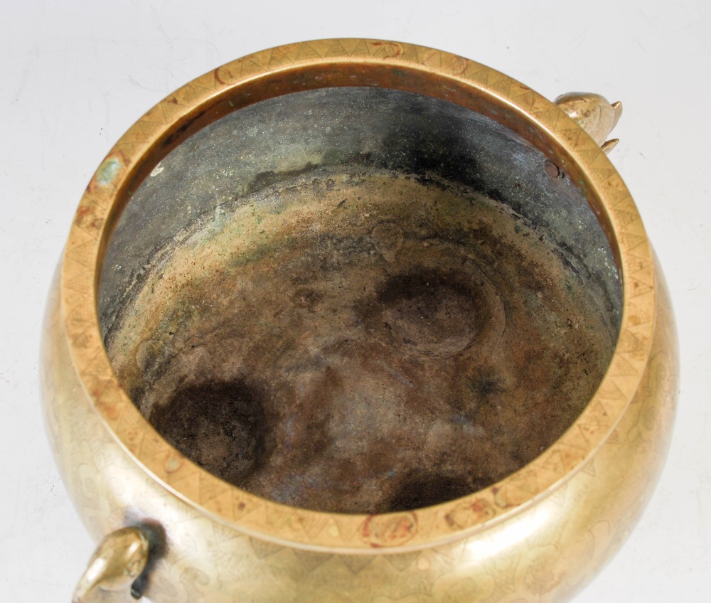 A Chinese bronze censer, of circular form, raised on three prong feet with applied fish shaped - Image 7 of 8