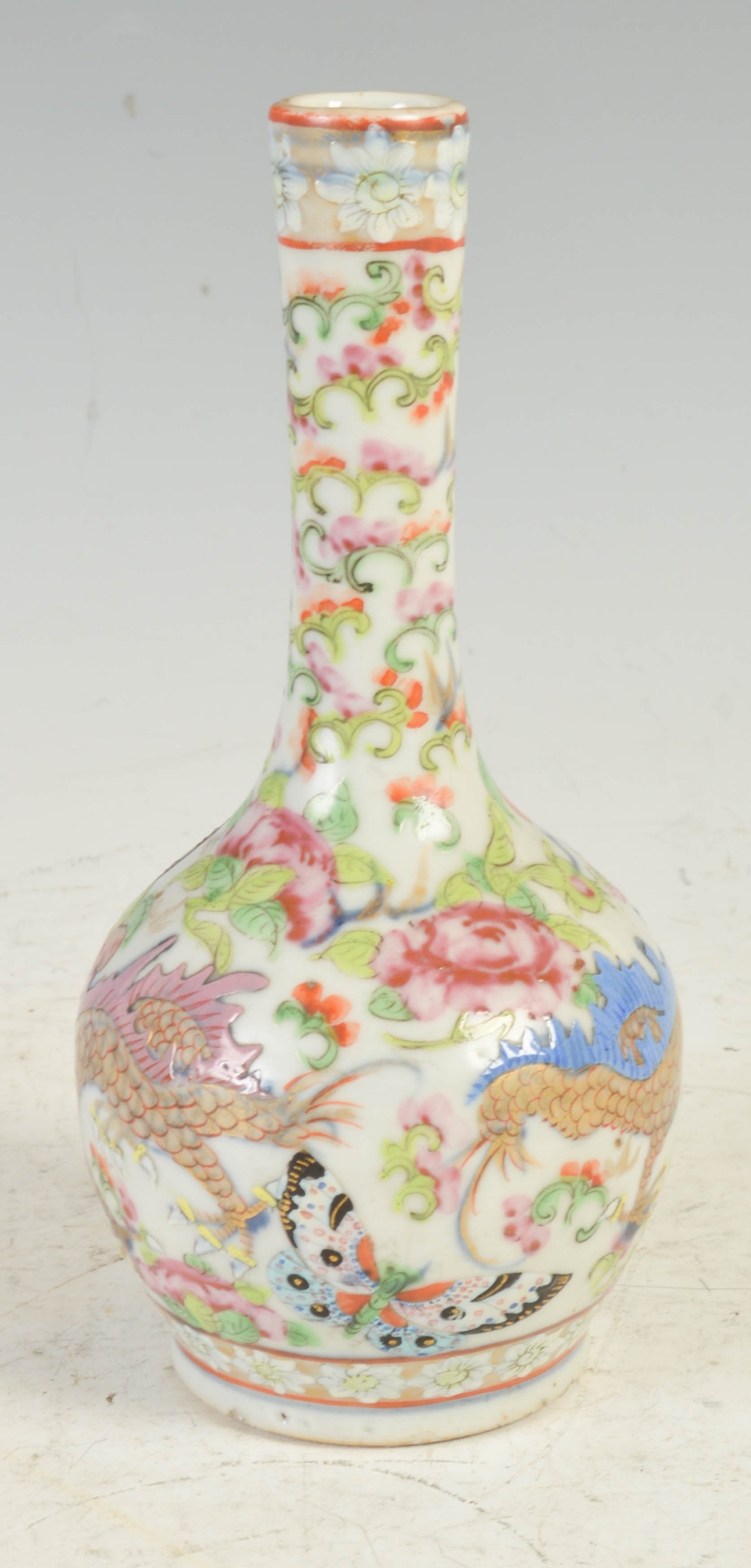 A Chinese porcelain Canton famille rose bottle vase, Qing Dynasty, decorated with a pair of - Image 3 of 5