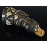 A highly unusual 19th century carved horn snuff mull, the terminal in the form of a bear's head with