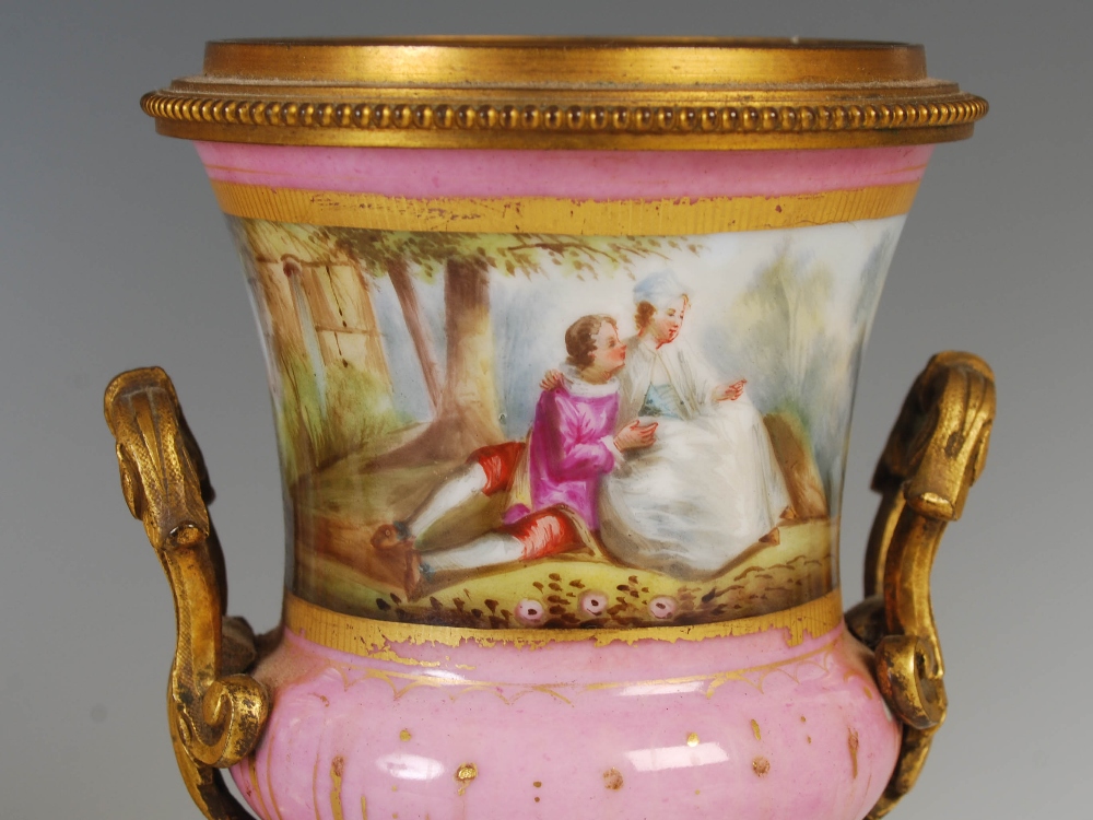 A 19th century ormolu and pink ground porcelain mounted clock garniture, the porcelain dial - Image 8 of 9