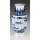 A Chinese blue and white porcelain arrow vase, late Qing Dynasty, decorated with pavilions and