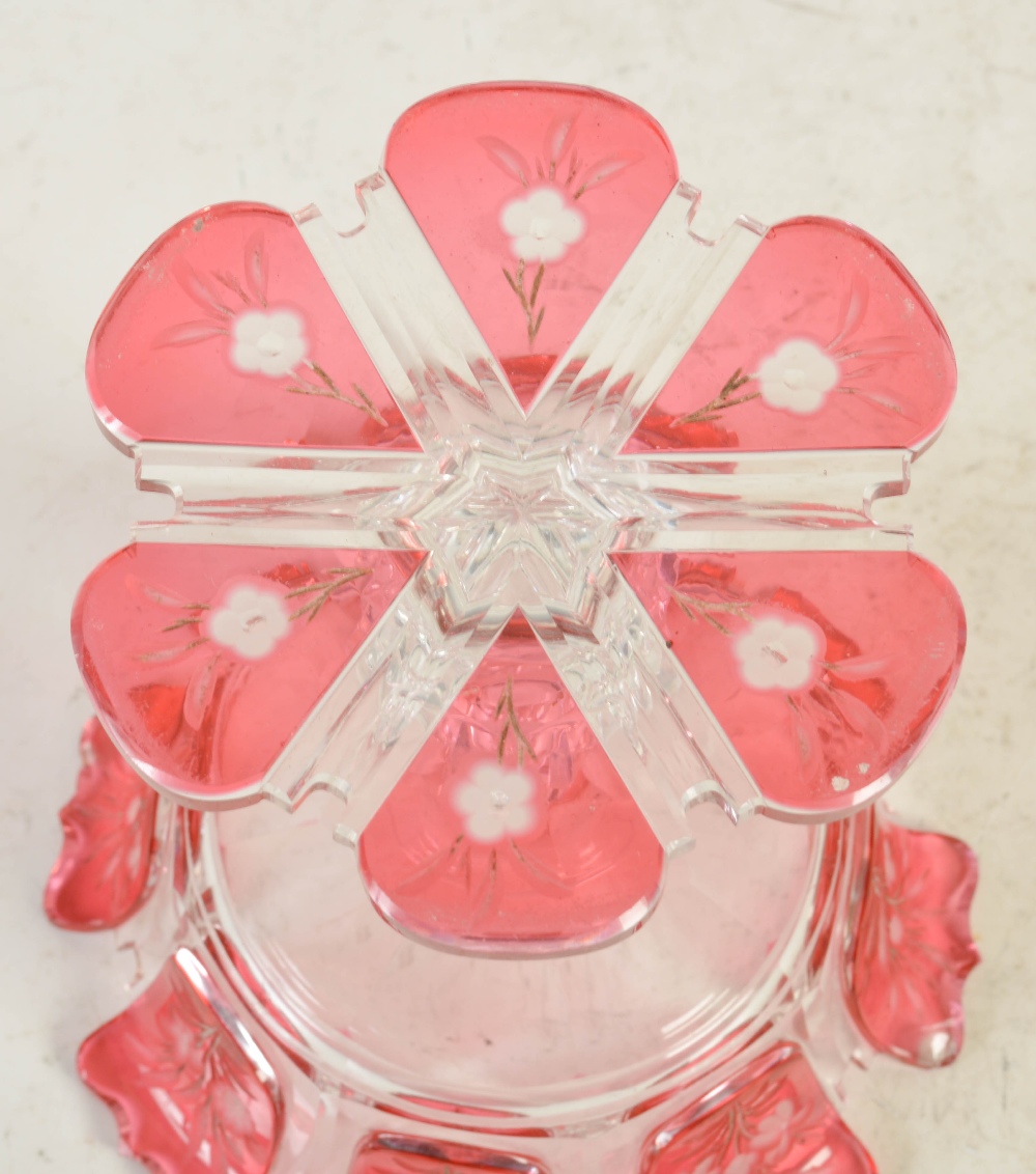 A late 19th century Bohemian ruby glass goblet, decorated in relief with panels of flowers and - Image 6 of 6