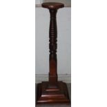 A mahogany jardiniere stand, 128cm high