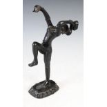 A late 19th/ early 20th century bronze figure of a temple dancer, 28cm high.