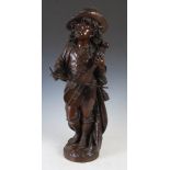 After Adolph Maubach, a late 19th/ early 20th century bronze figure of a violin player, signed in