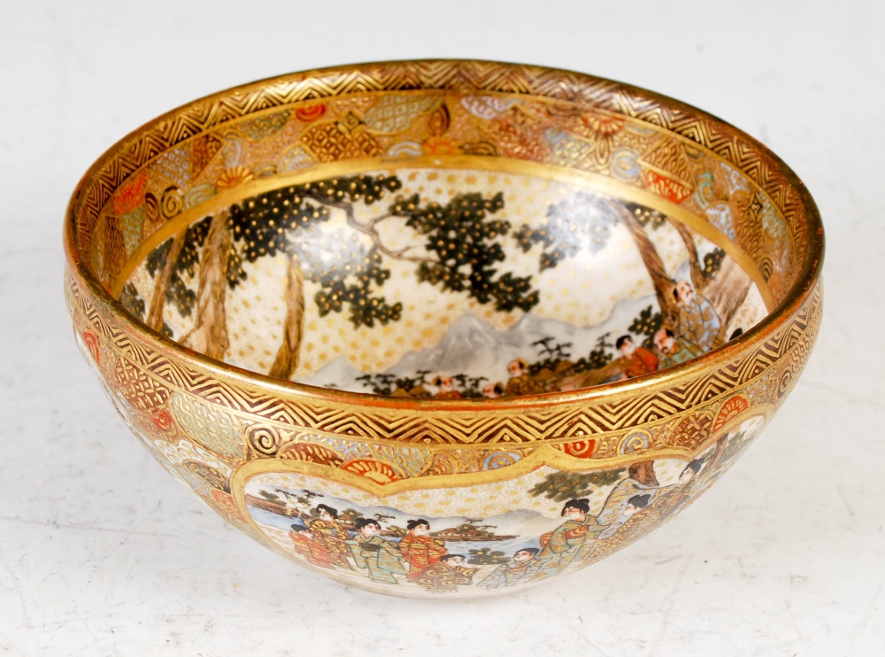 A Japanese Satsuma pottery bowl, Meiji Period, the interior decorated with a crowd of figures, the