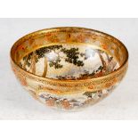 A Japanese Satsuma pottery bowl, Meiji Period, the interior decorated with a crowd of figures, the