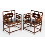 A pair of Chinese darkwood, possibly Jichimu wood, rose chairs (meiguiyi), Qing Dynasty, with
