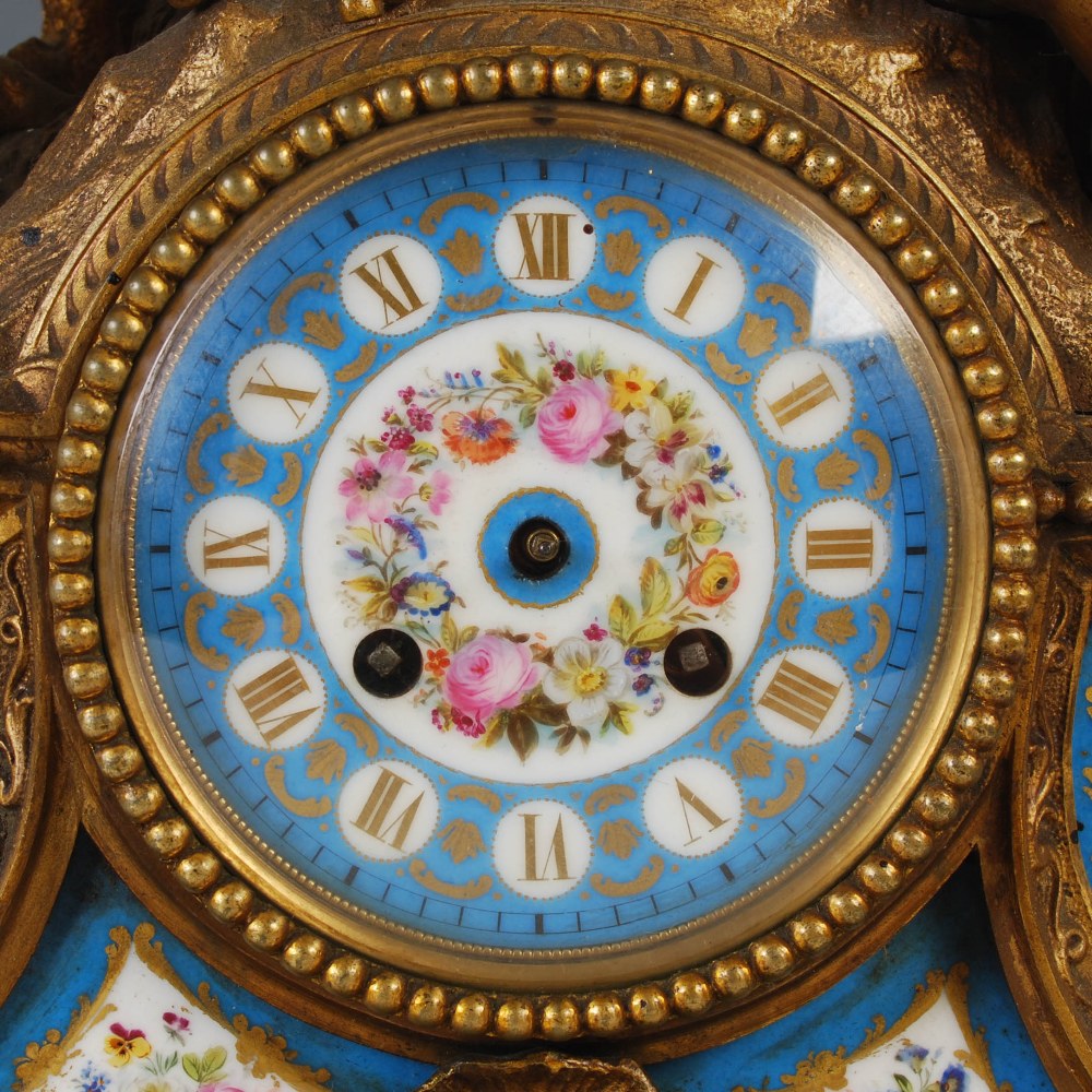 A late 19th century French gilt metal and porcelain mounted mantle clock, the circular blue ground - Image 2 of 7