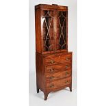 A George III mahogany and ebony lined secretaire bookcase of neat proportions, the upper section