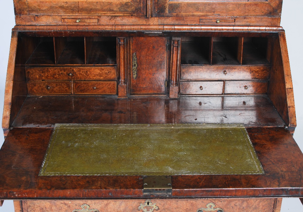 A George III walnut bureau bookcase, the moulded cornice above a pair of mirrored cupboard doors, - Image 7 of 14