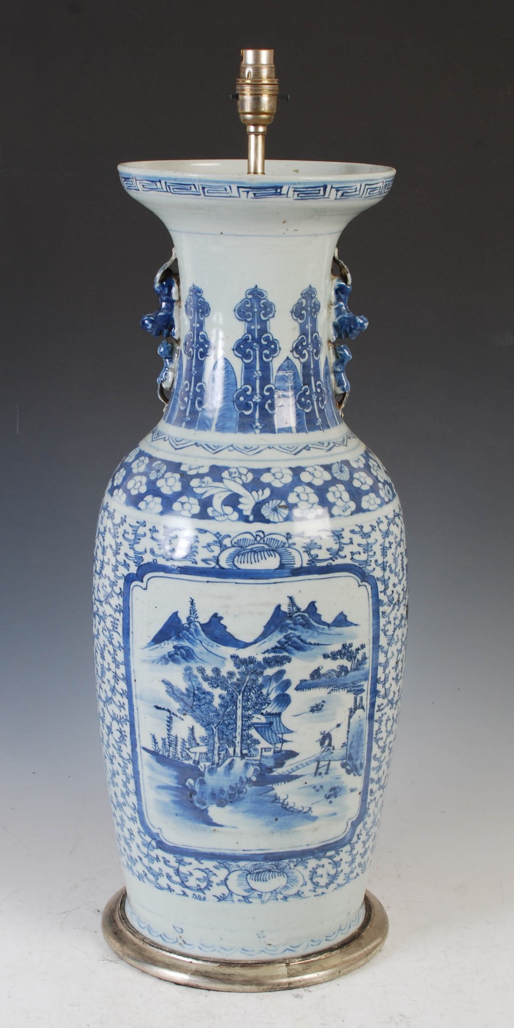 A Chinese porcelain blue and white vase mounted as a table lamp, late Qing Dynasty, decorated with