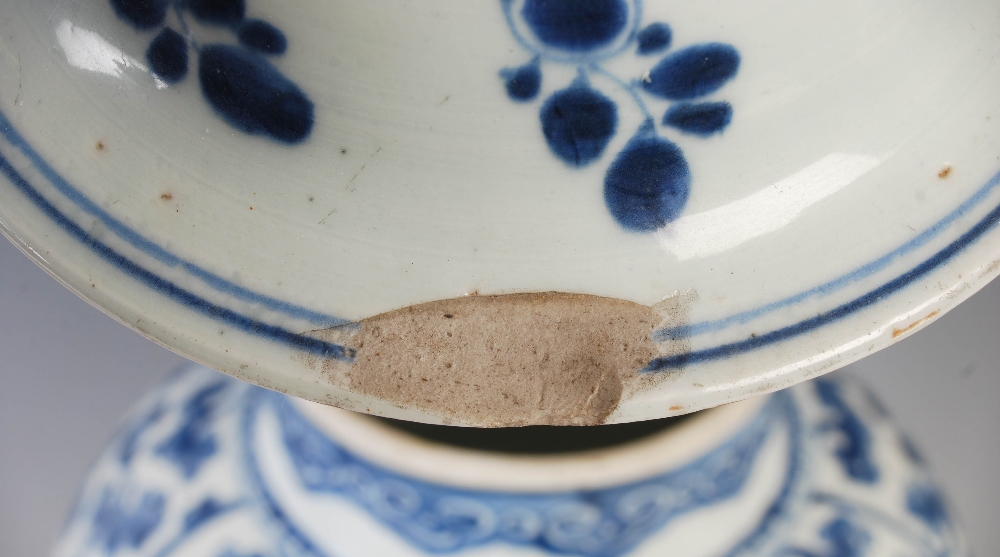 A Chinese porcelain blue and white jar and cover, Qing Dynasty, decorated with phoenix, peony and - Image 6 of 12