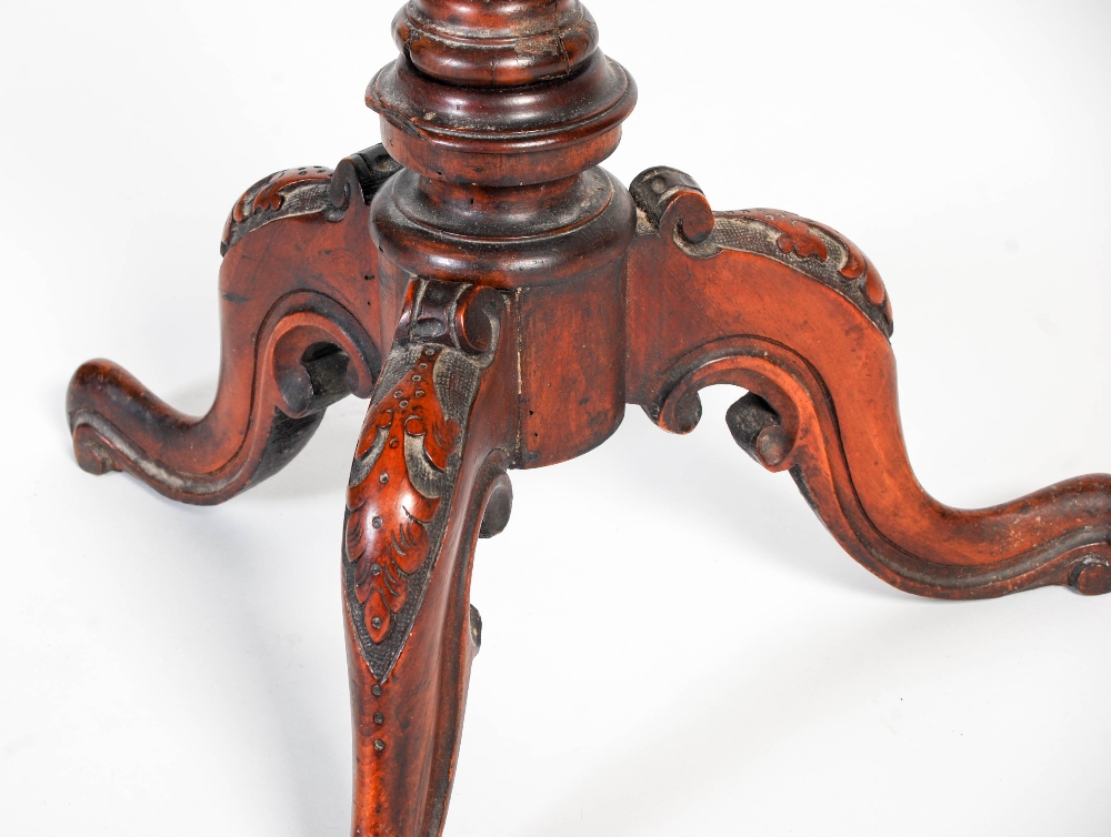 A 19th century walnut occasional table, the circular top with foliate carved edge on a tapered - Image 6 of 8