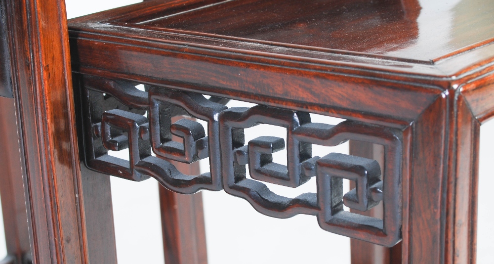 A nest of three Chinese dark wood occasional tables, late 19th/ early 20th century, the - Image 5 of 8