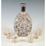 An early 20th century Chinese sterling silver mounted whisky decanter, stopper and six tot