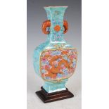 A Chinese porcelain turquoise blue ground two handled bottle vase, Qianlong seal mark but later,
