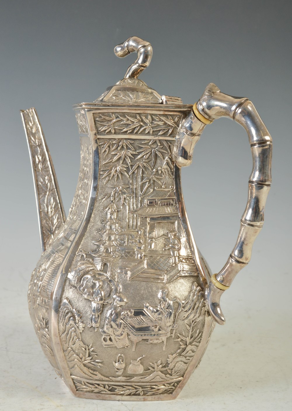 A late 19th century Chinese silver four piece tea and coffee set, WANG HING, lozenge shaped with - Image 6 of 7