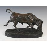 A bronze figure of a bull after Paul Comolera (French 1818-1897), signed in the bronze, on black