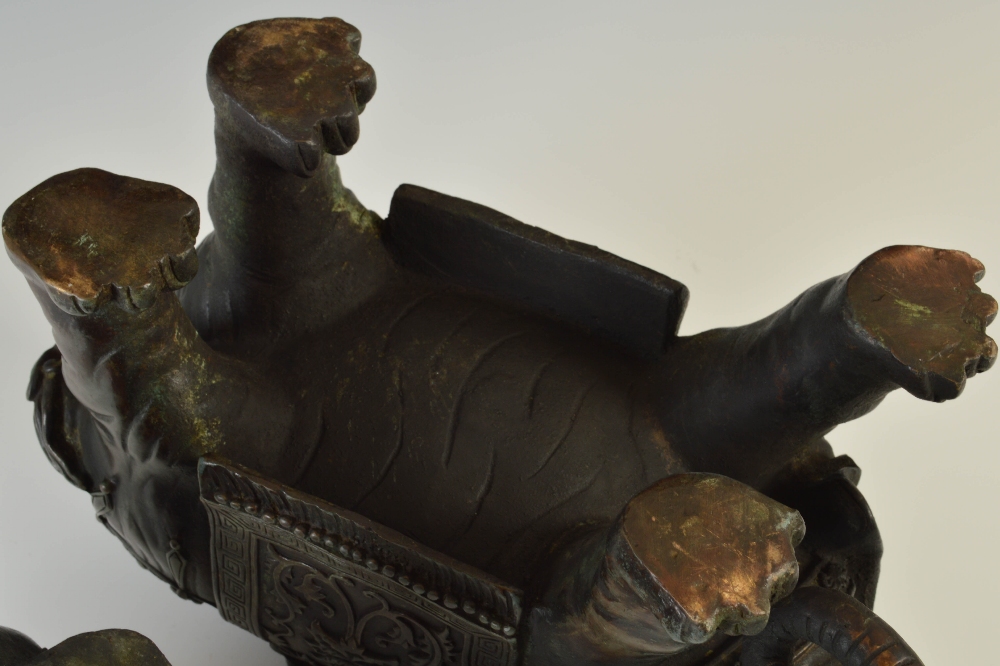 A pair of Chinese bronze elephant incense burners, Qing Dynasty, modelled in two sections, the upper - Image 6 of 6