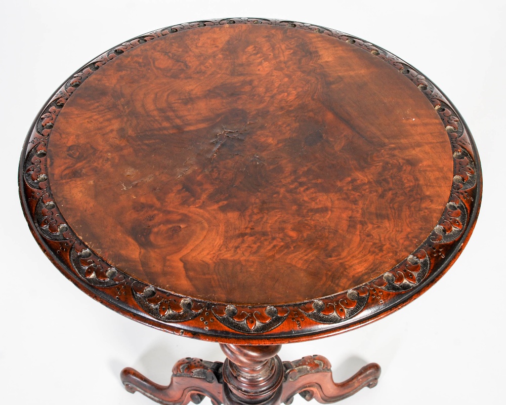 A 19th century walnut occasional table, the circular top with foliate carved edge on a tapered - Image 2 of 8