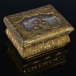 A mid 18th century gilt-metal and agate oblong snuff box, with incurved sides chased with foliage,