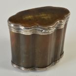 A mid 18th century horn upright serpentine-shaped snuff box, with plain silver mounts maker's