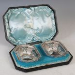 A pair of cased Victorian silver bonbon dishes, London, 1892, makers mark of GMJ, octagonal shaped