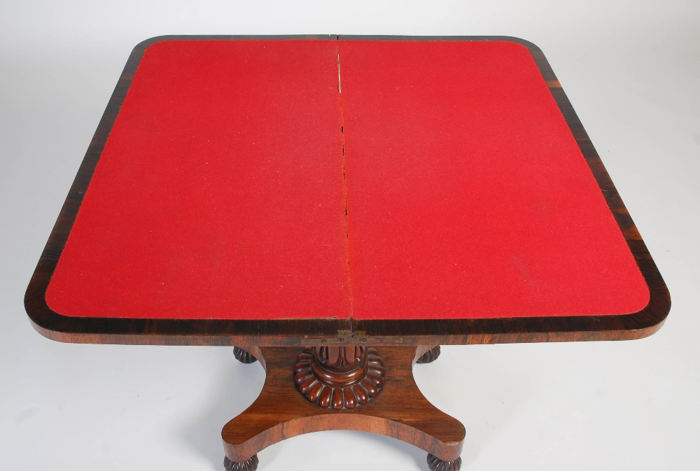 A 19th century rosewood pedestal card table, the hinged rectangular top opening to a red baize-lined - Image 7 of 8