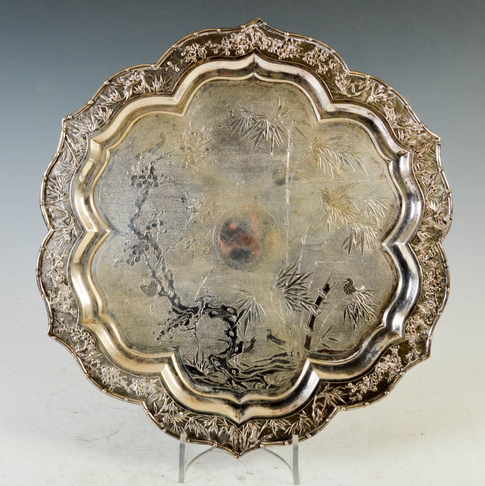 A late 19th century Chinese silver salver/ tray, WANG HING, of shaped hexagonal form with engraved