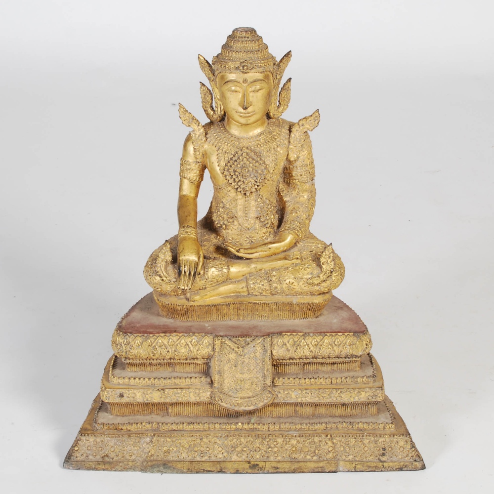 A Thai gilt metal figure of Buddha, on stepped plinth, 90cm high