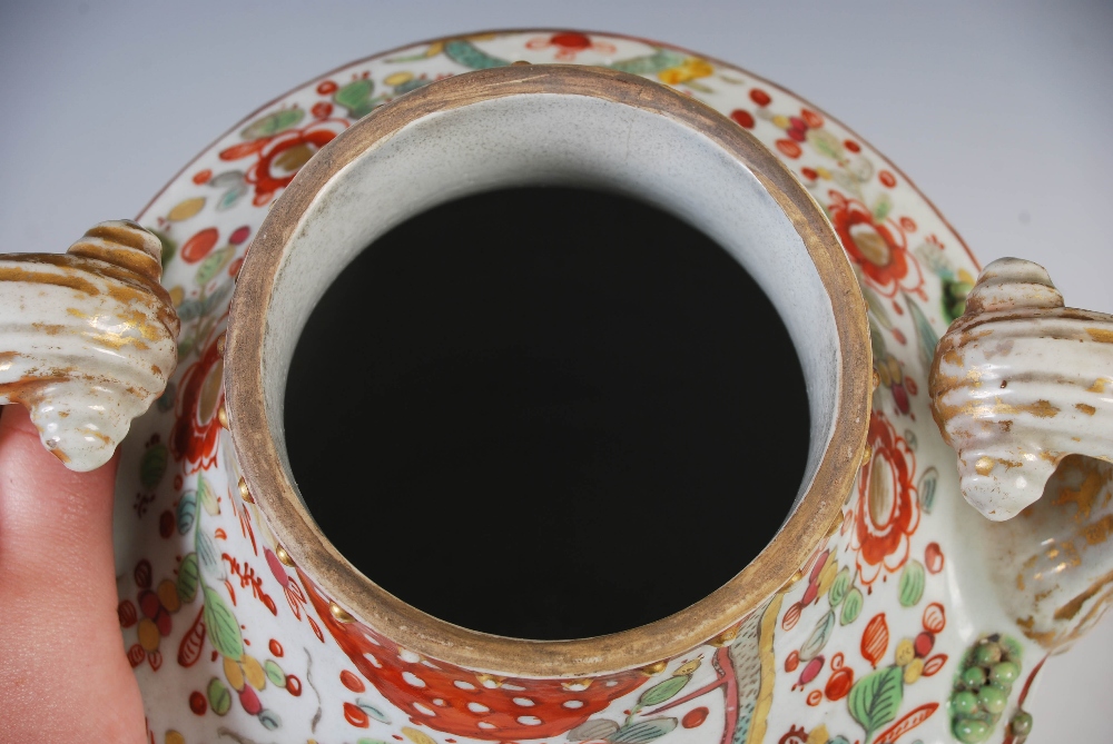 A Chinese porcelain twin-handled urn and cover, Qing Dynasty, decorated with two oval shaped - Image 7 of 10