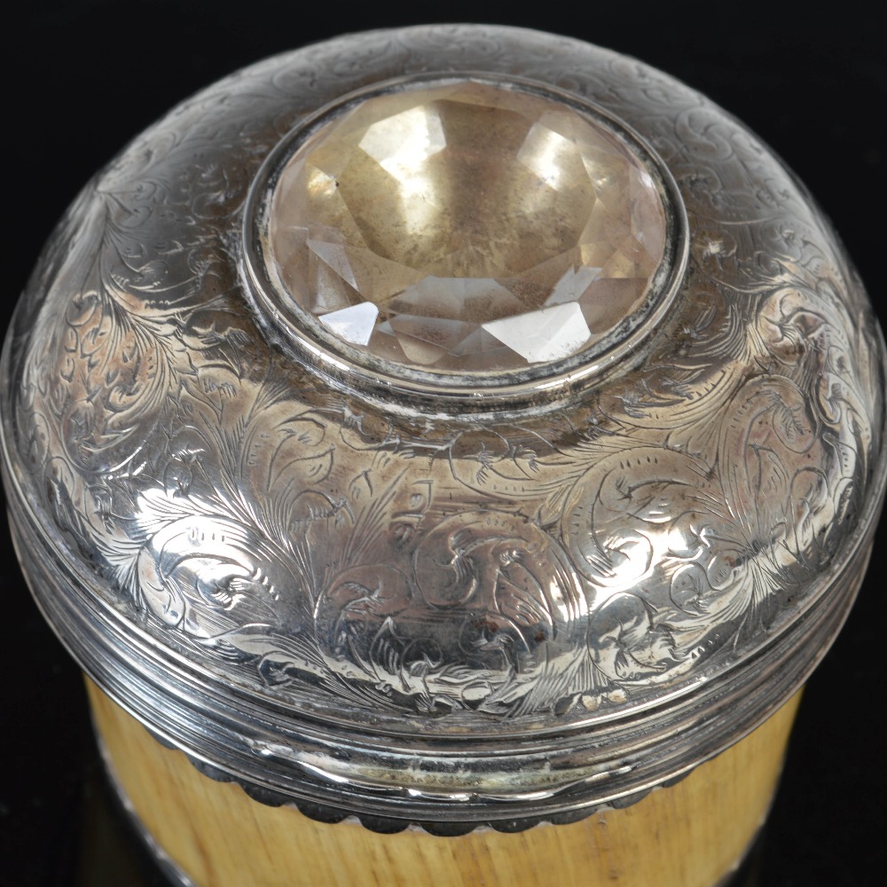 An early 19th century horn circular table snuff box, the domed silver cover profusely engraved - Image 3 of 3