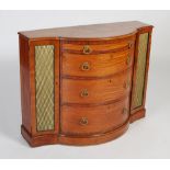 A 19th century mahogany and marquetry inlaid bowfront side cabinet, the shaped top with Neoclassical
