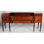 A 19th century Scottish mahogany and ebony lined sideboard, the stage back with two sliding doors