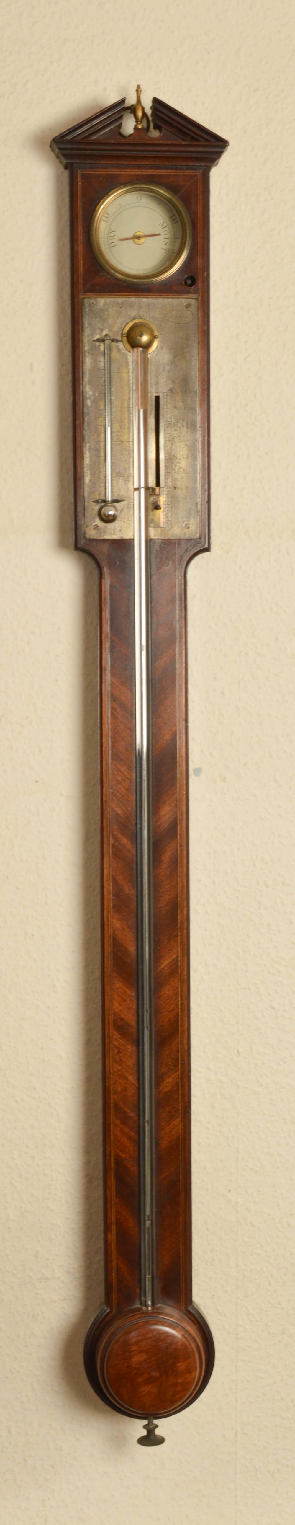 A George III mahogany, boxwood and ebony lined stick barometer, Watkins, St. Fa's Street, London,