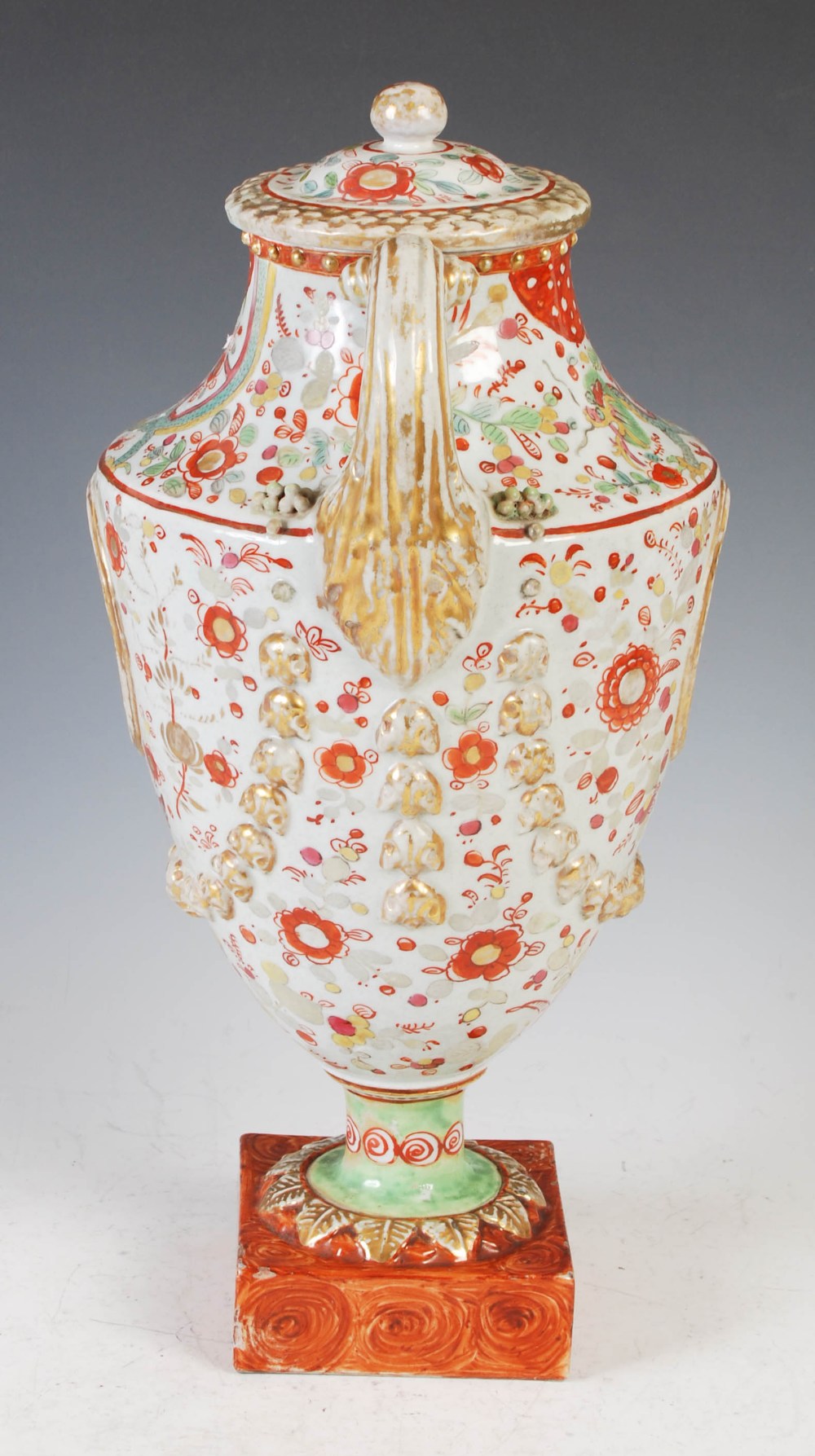 A Chinese porcelain twin-handled urn and cover, Qing Dynasty, decorated with two oval shaped - Image 2 of 10
