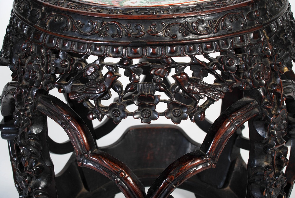 A Chinese darkwood and porcelain mounted barrel-shaped stool, Qing Dynasty, the circular top inset - Image 4 of 6